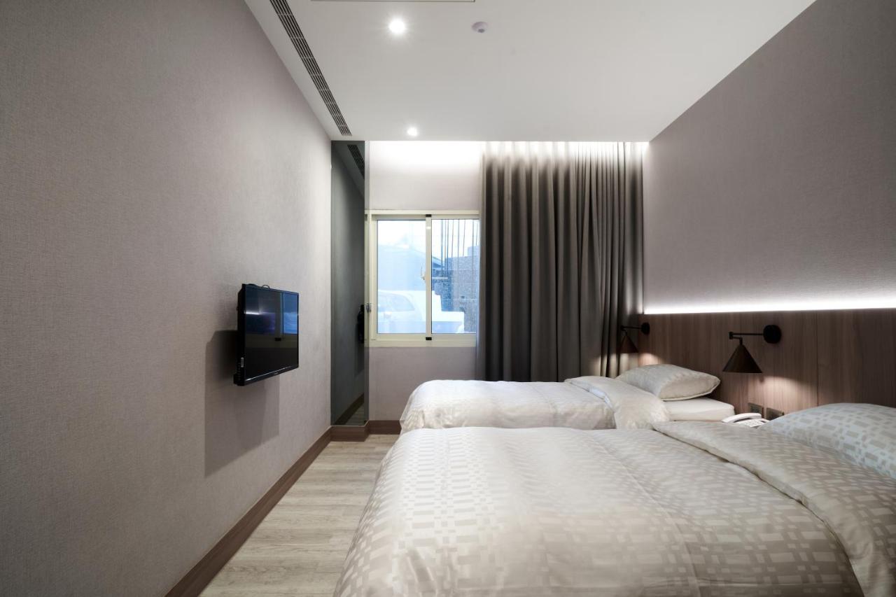 Yung An Business Hotel Dounan Extérieur photo